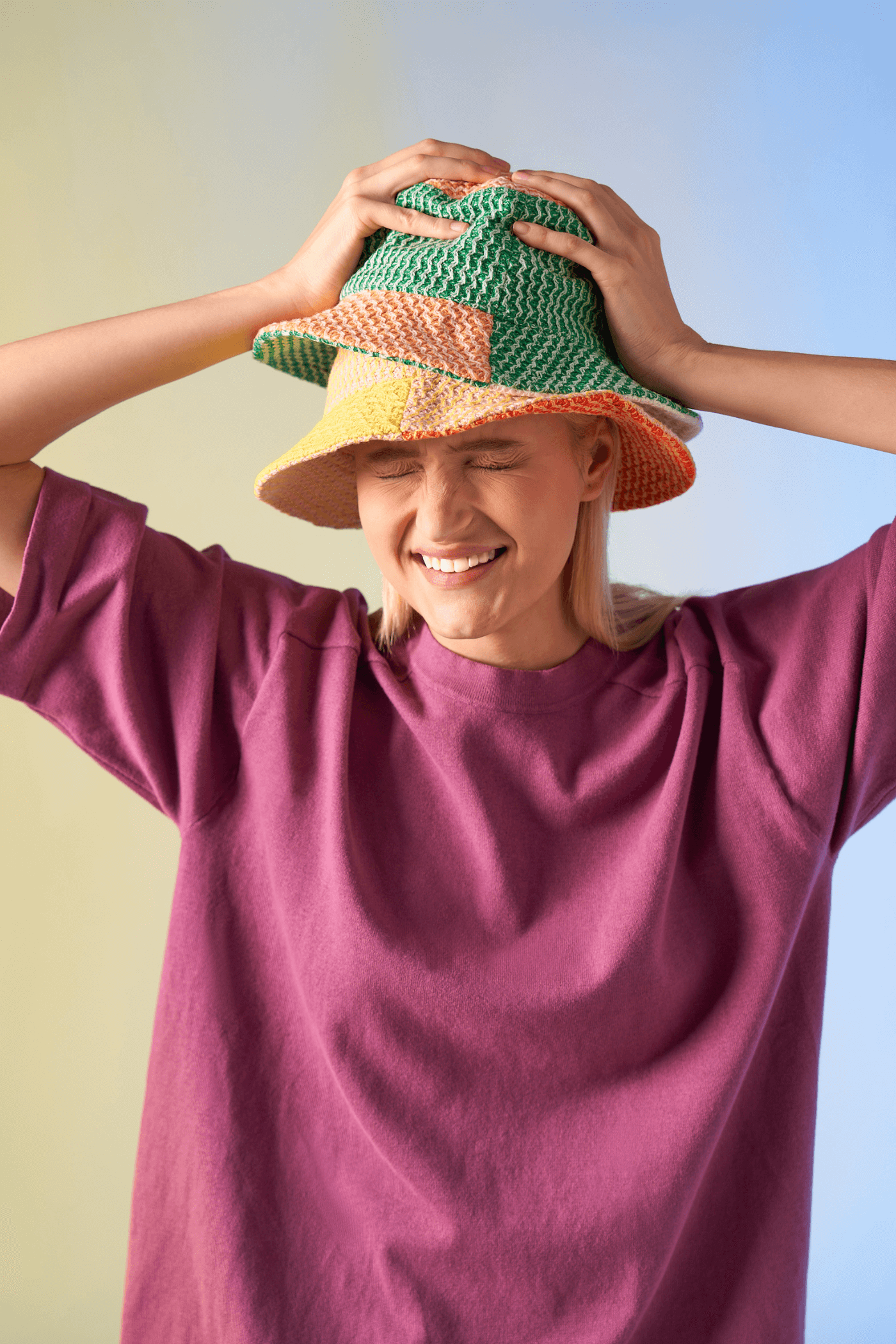 knit bucket hats on model